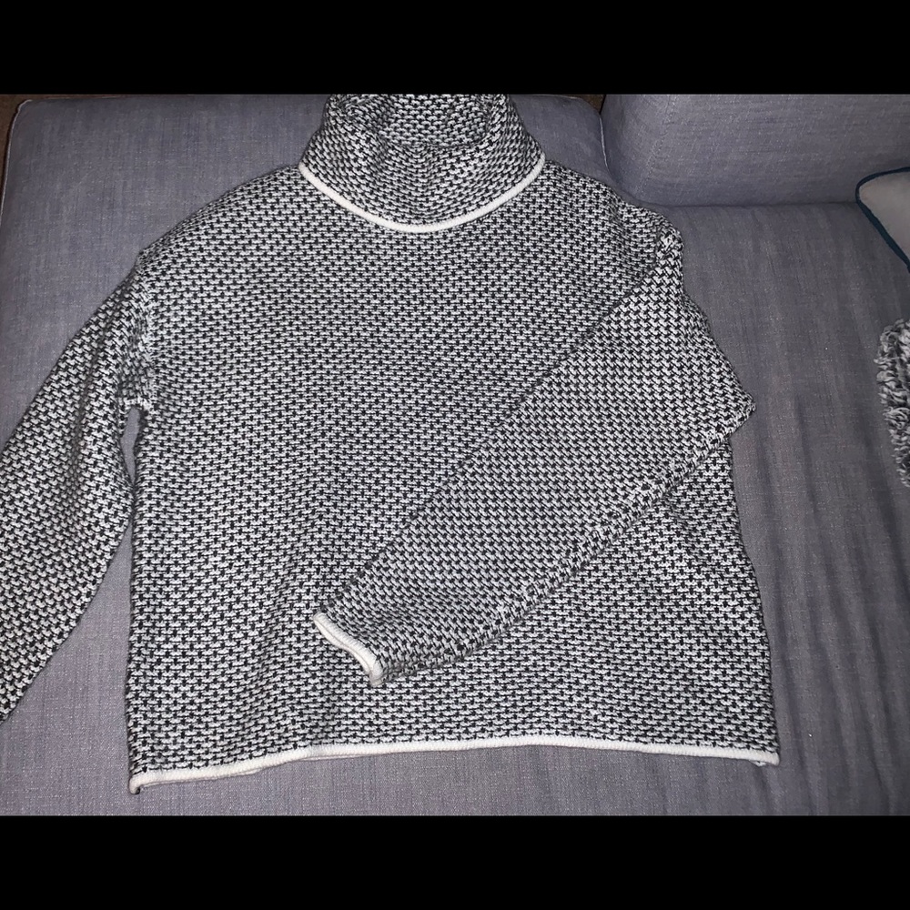 Loose fitting knit turtleneck sweater